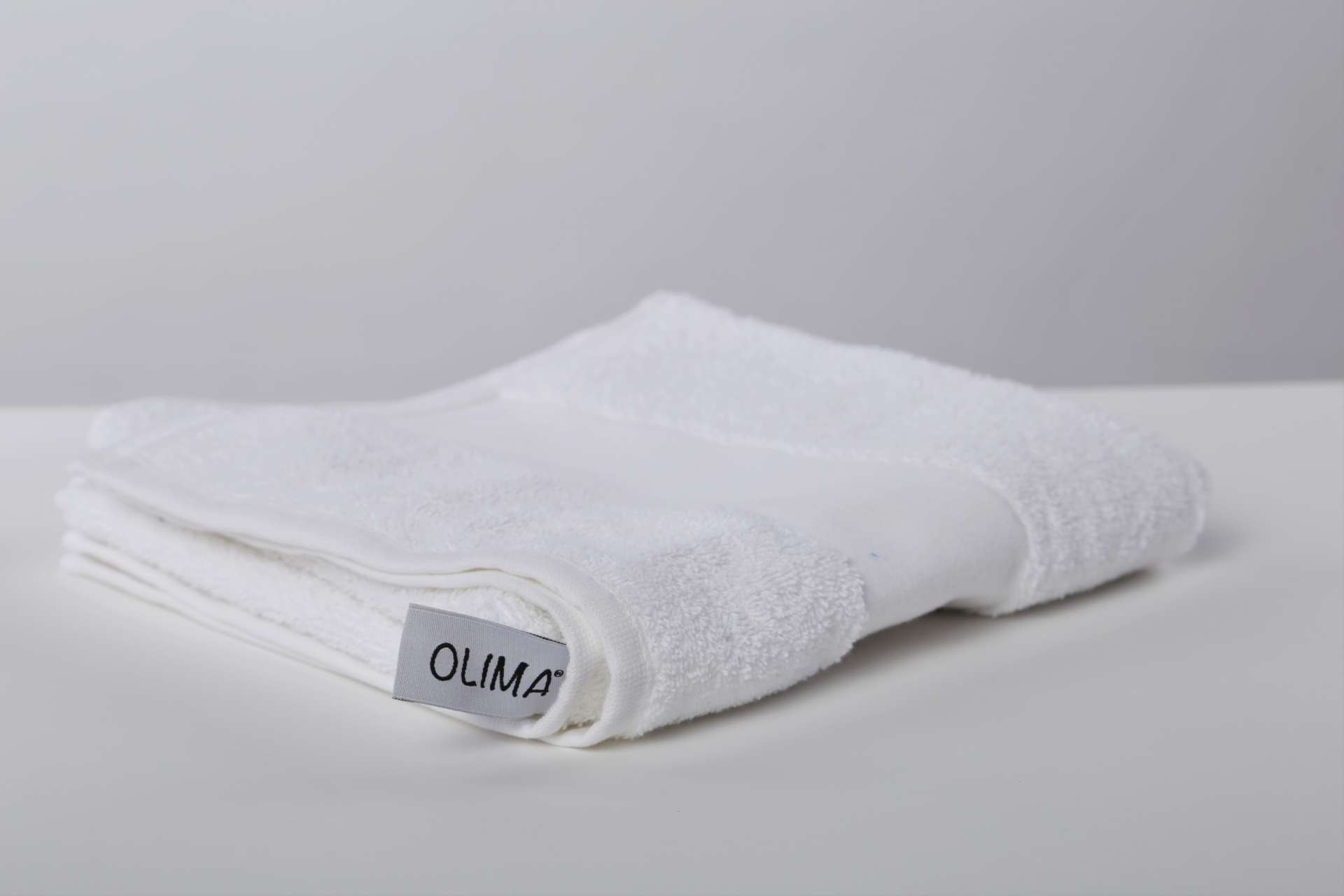 OLIMA CLASSIC TOWEL s logom 